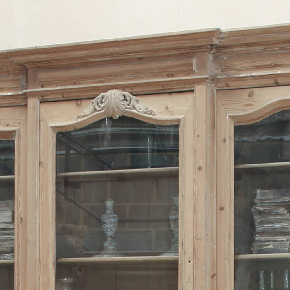 19c French bibliotheque breakfront bookcase with original glass and nine drawers cornice close-up