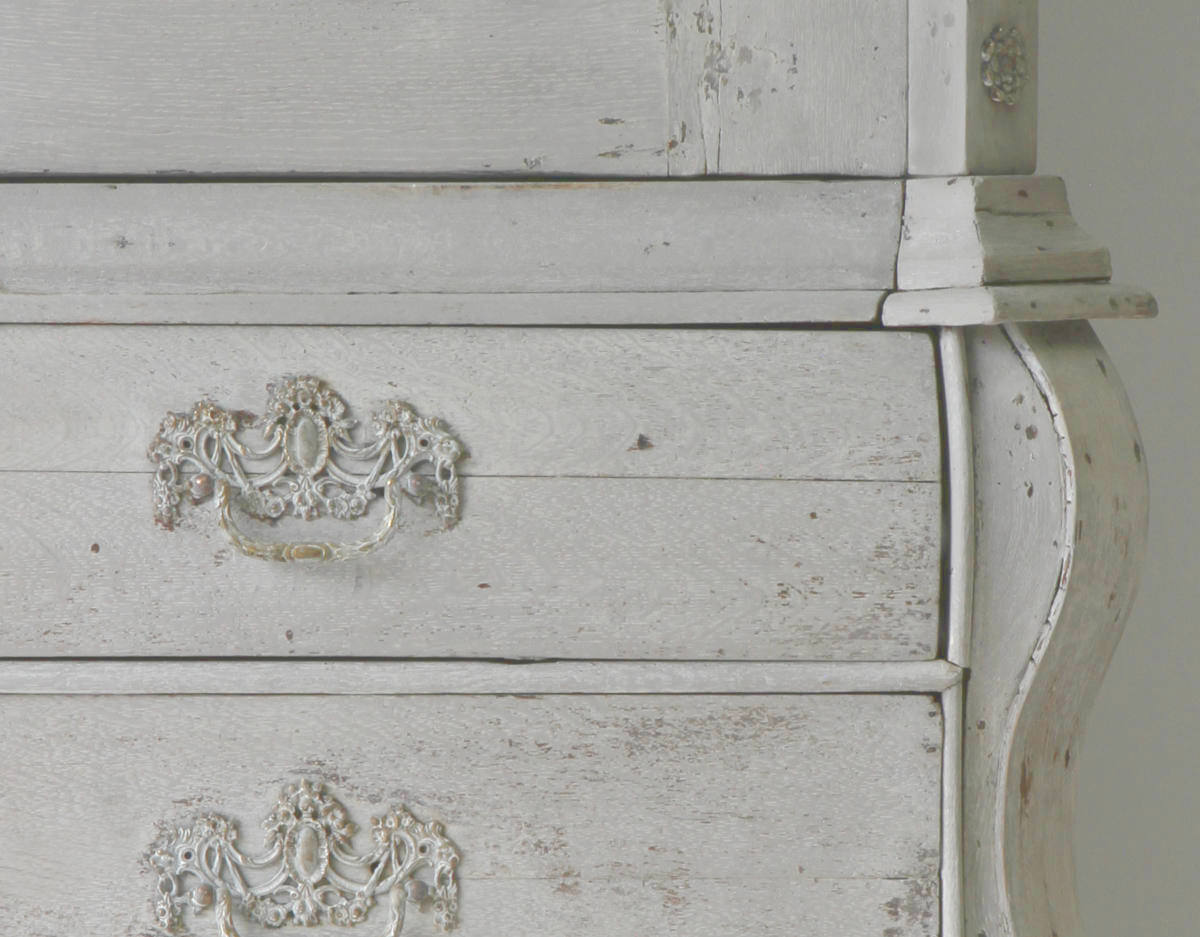 Close up view showing Dutch linen press drawers and handles