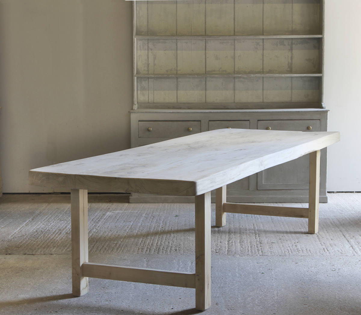 Imposing Normandy table with a thick chunky two plank top