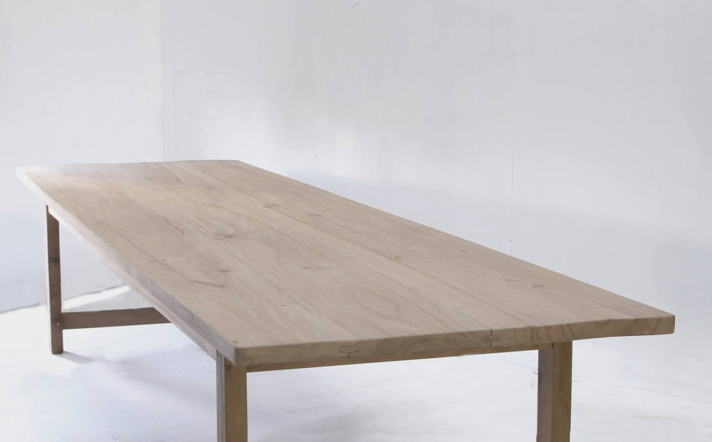 Full length view of a Normandy farm table in elm showing wood grain structure