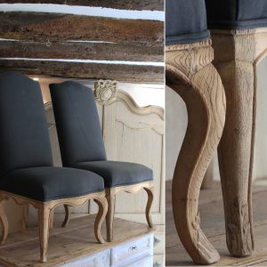 A pair of stylish French antique chairs in oak with charcoal linen fabric