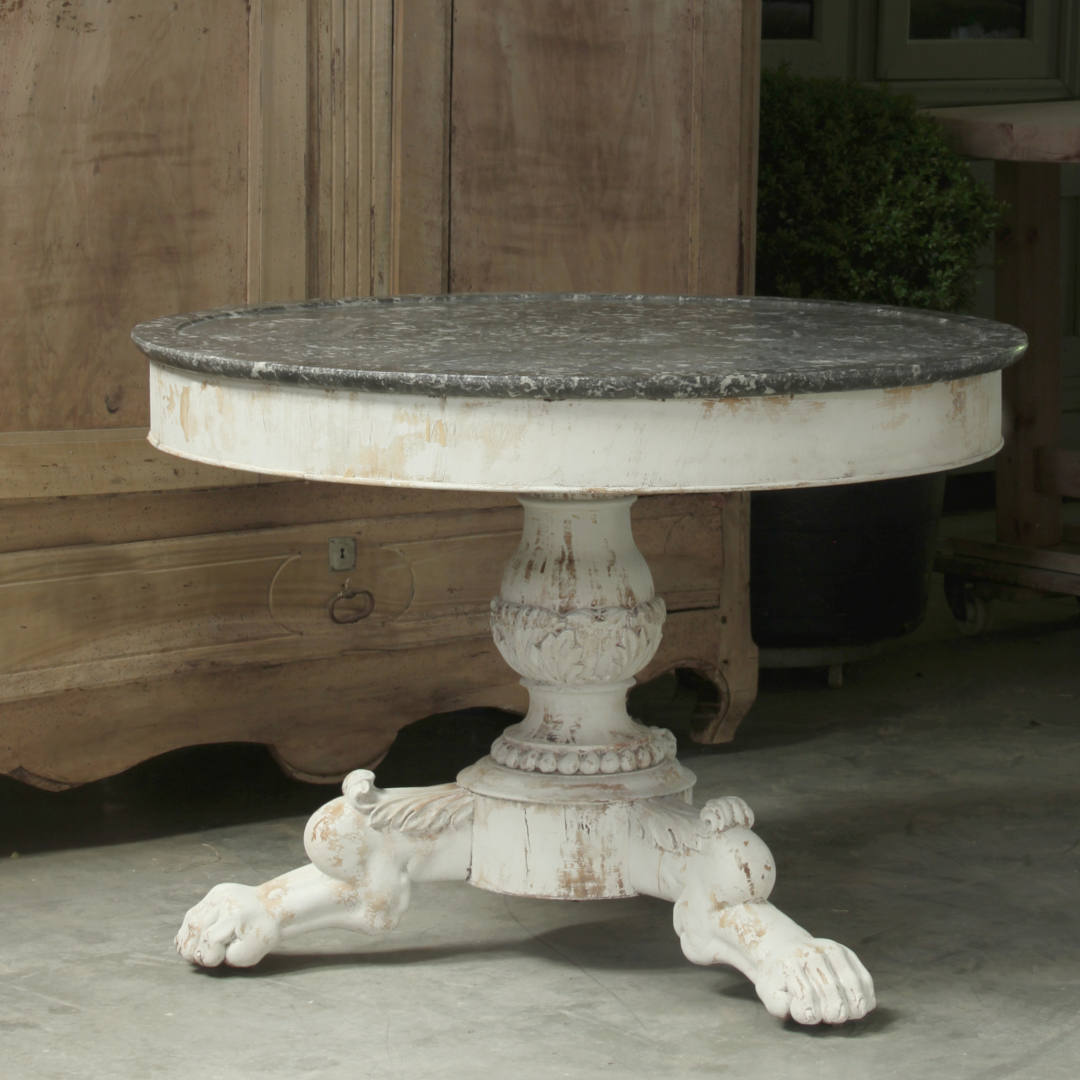 Classic gueridon table with a veined marble top