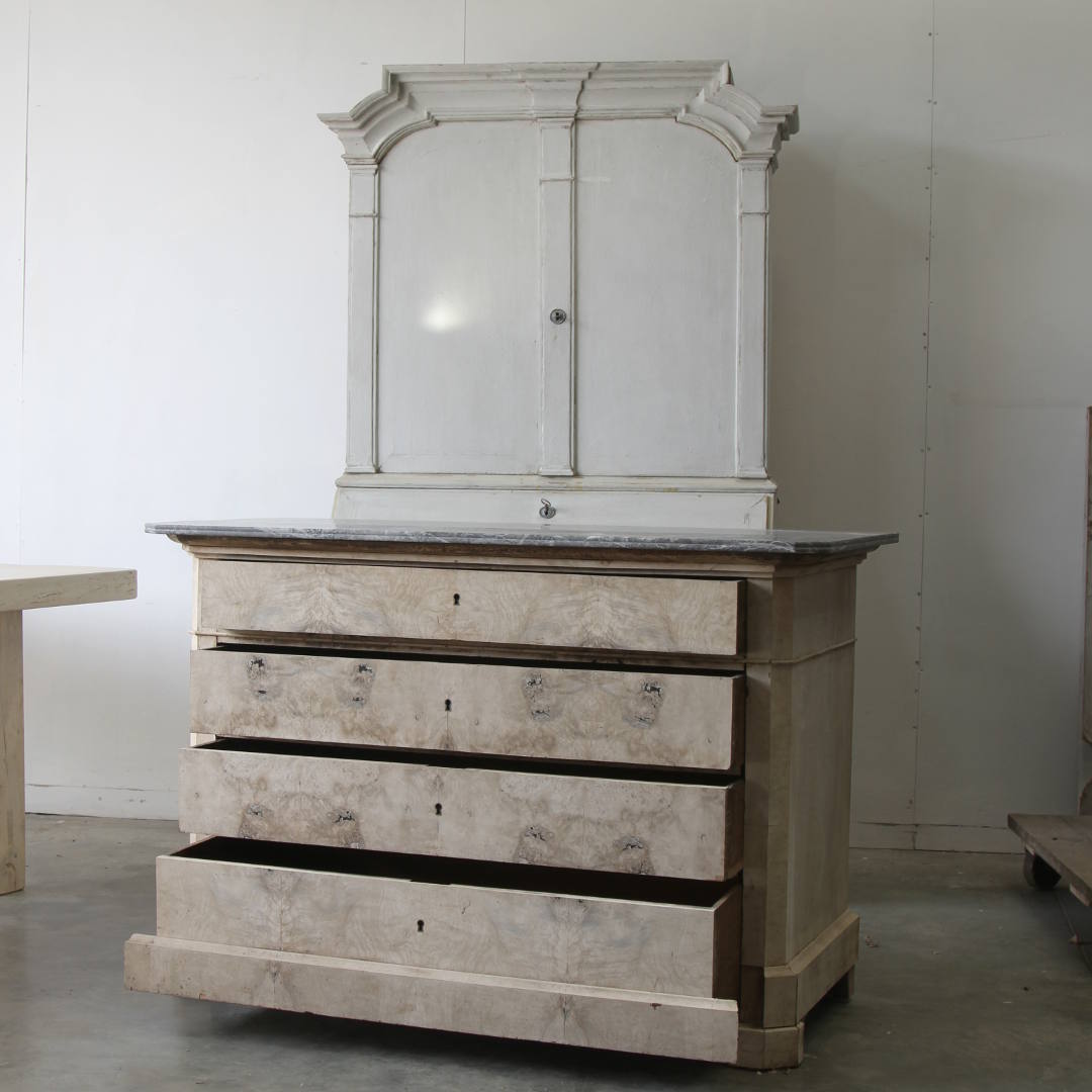 A bleached Louis Philippe commode with all four drawers open