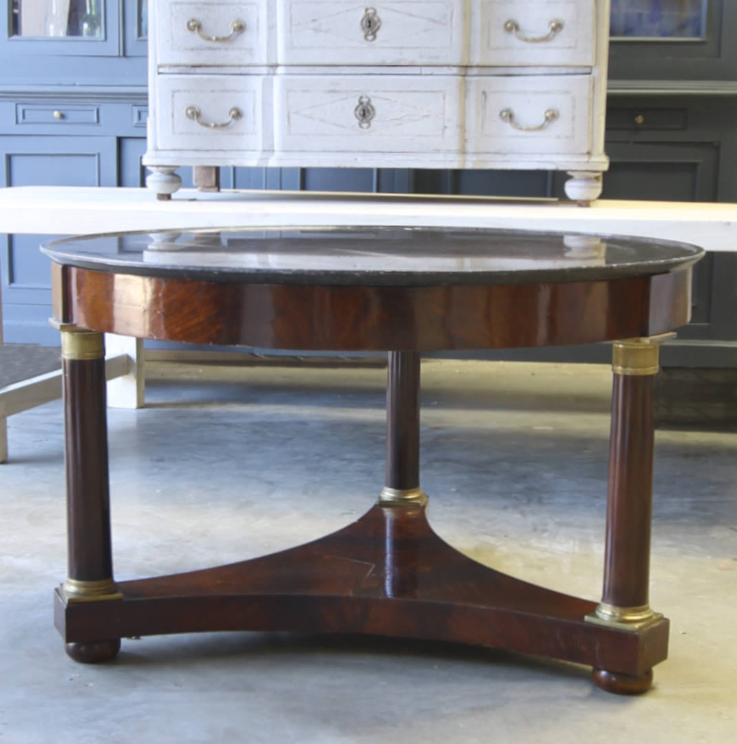 An outstanding example of this classic empire period marble top gueridon table